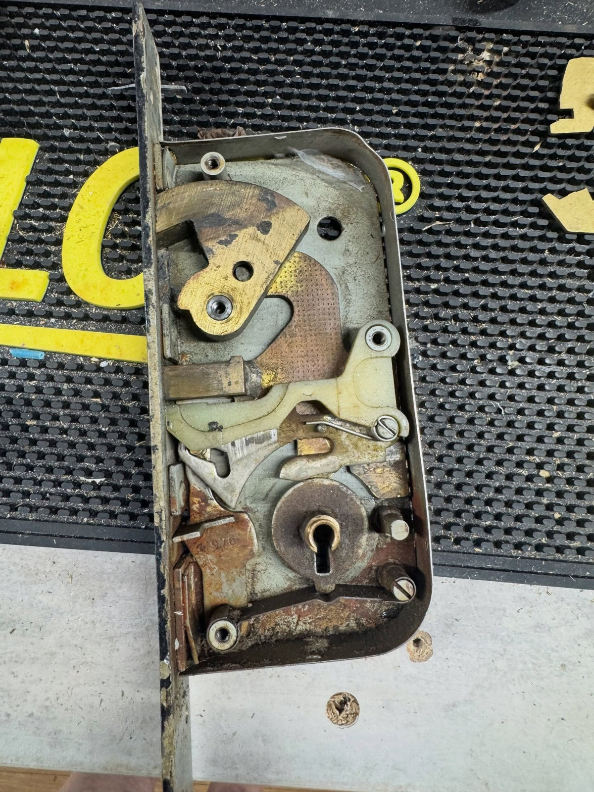 inside of Chubb 110 mortice deadlock laid on black matt