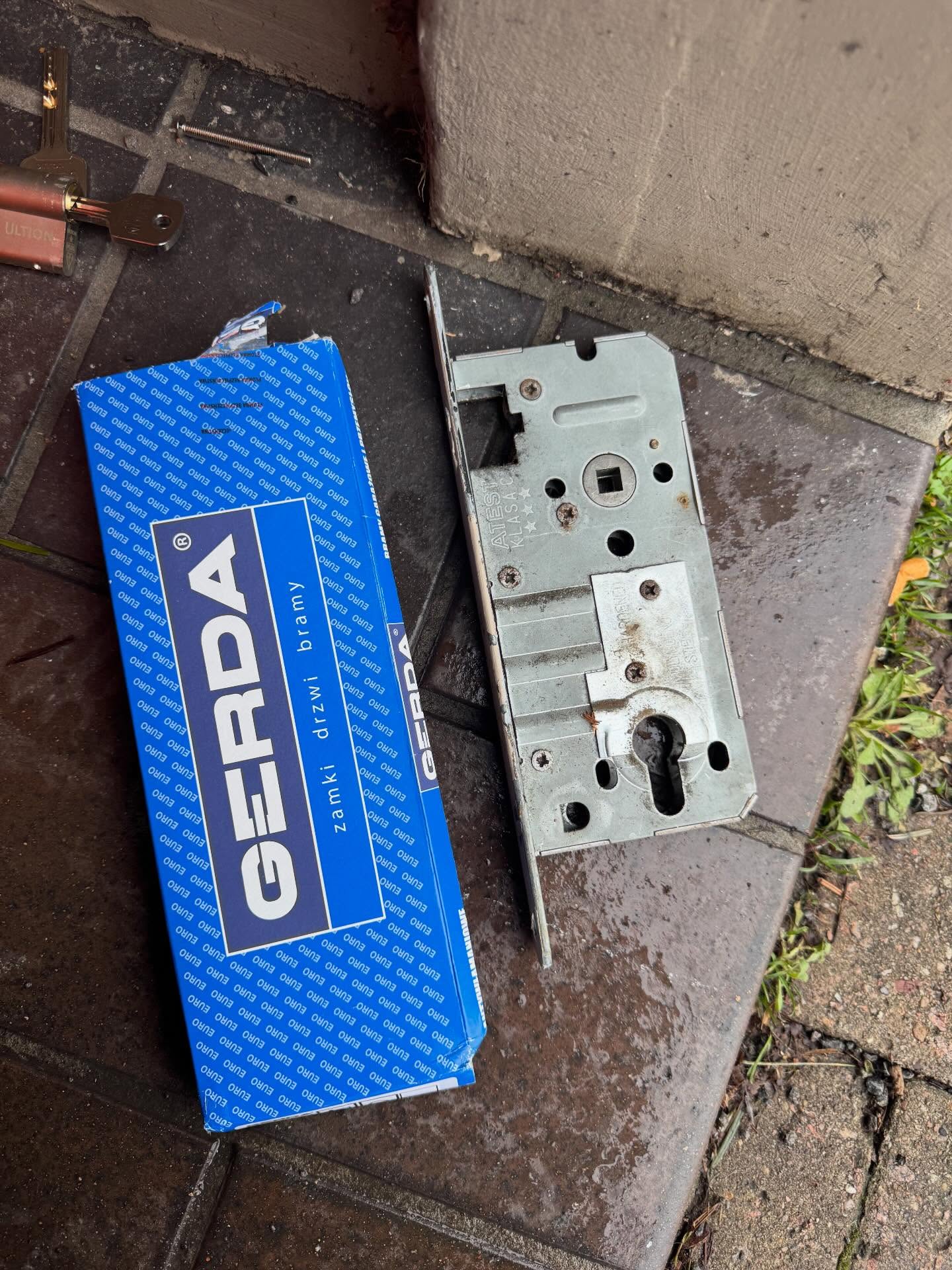 Lock mechanism and GERDA branded box on a concrete surface