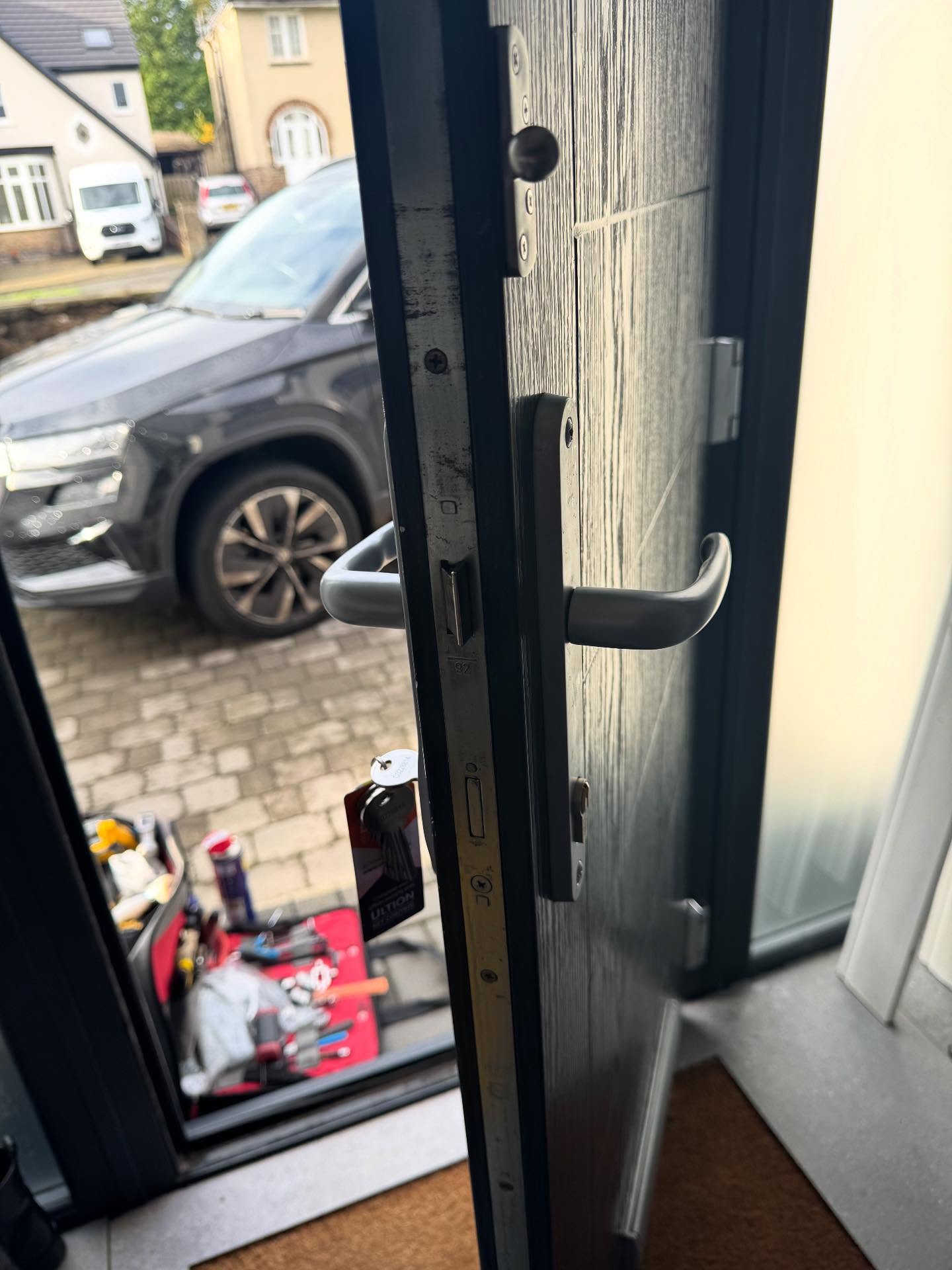 lock fitted to grey door after opening the door using non destructive entry method