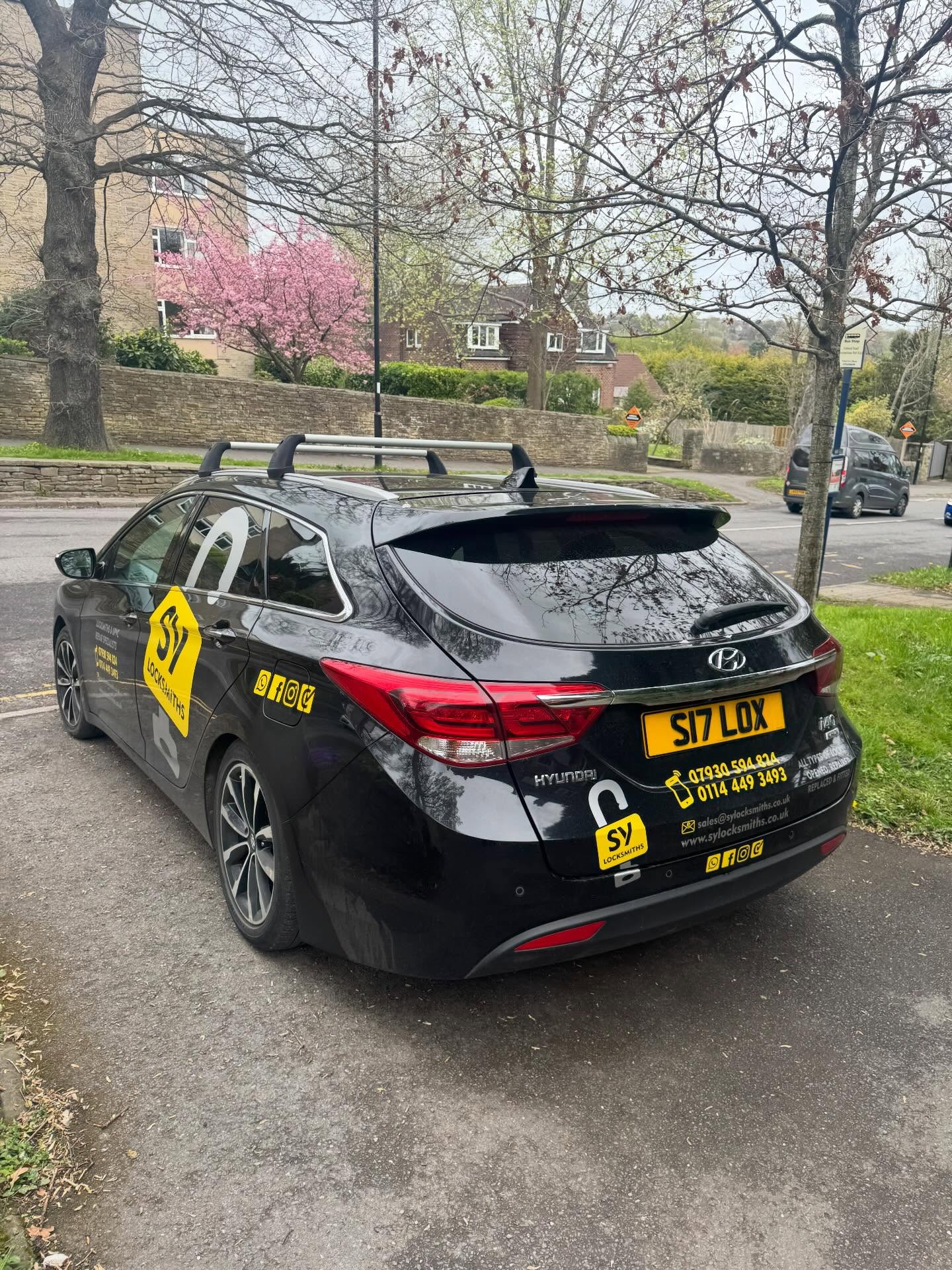 SY Locksmiths branded vehicle parked outside customers house in Nether Edge 